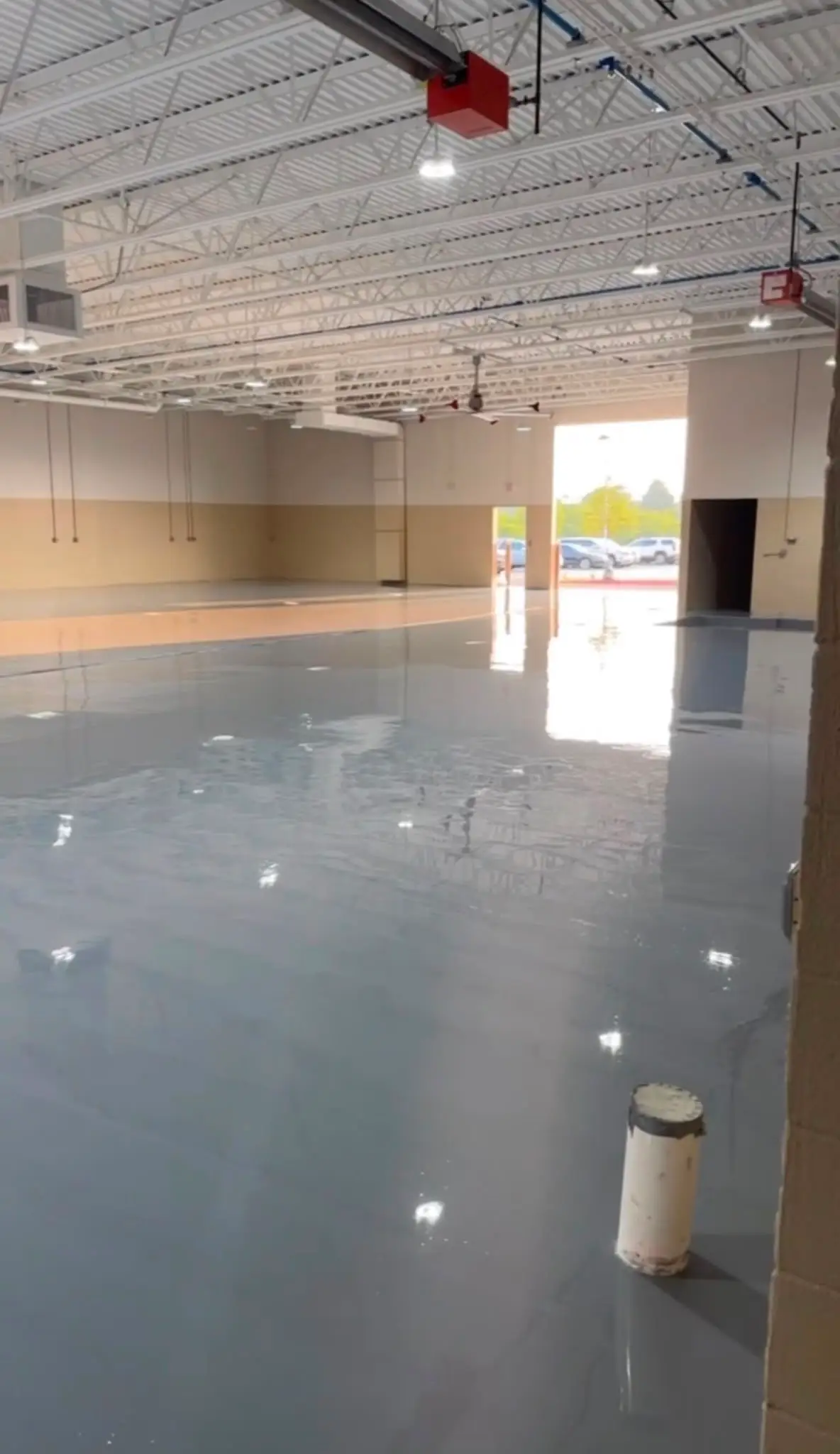 Seamless solid color epoxy floor in a warehouse bay
