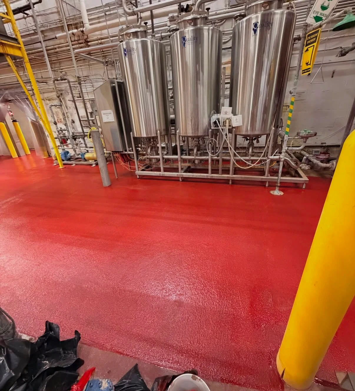 Red urethane cement floor in a beverage plant